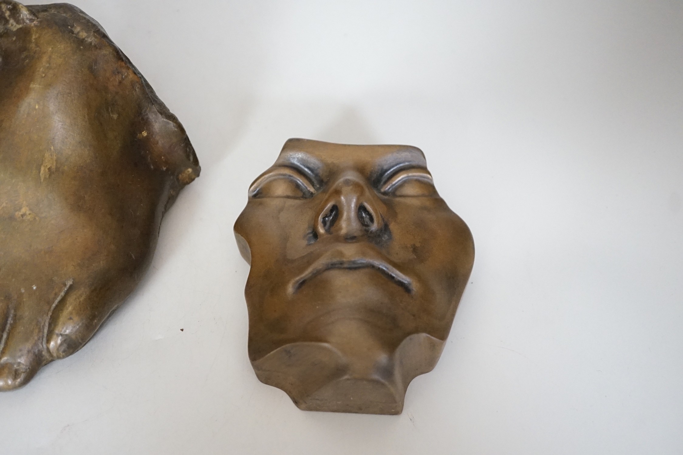 A limited edition life size bronze foot and two resin parts